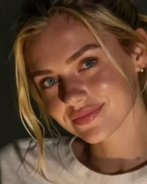 Preview of a custom AI girlfriend profile named Lena